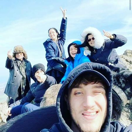 John Abraham Hewson and his family took a picture together.